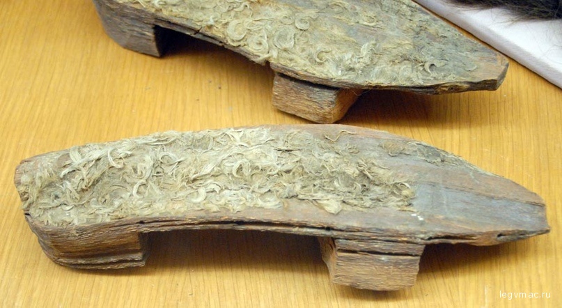 2nd century shoes with wool uppers and wood (beech wood?) soles found at Martres-de-Veyre in 1893.