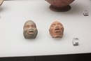 Карикатурные маски  африканца и старика.
Кёльн, Нойссер штрассе.